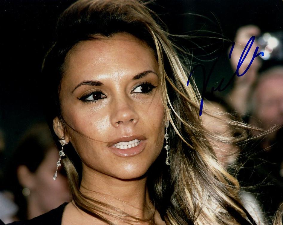 Victoria Beckham BEAUTIFUL In Person Signed Photo: Photo size is 8x10. Victoria Beckham in person signed photo. Victoria Beckham is an English fashion designer, singer, and television personality. She rose to prominence in the 1990s as a member of the