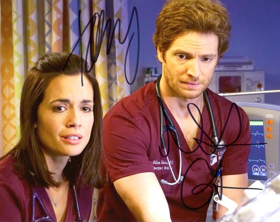 Nick Gehlfuss / Torrey DeVitto CHICAGO MED In Person Signed Photo: Photo size is 8x10. Nick Gehlfuss / Torrey DeVitto in person signed autographed photo from the TV series CHICAGO MED. Nick Gehlfuss as the character will Halstead. Torrey DeVitto as the character Nata