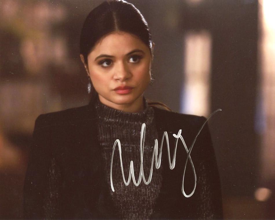 Melonie Diaz CHARMED In Person Signed Photo: Photo size is 8x10. Melonie Diaz in person signed autographed photo from the TV series CHARMED. Melonie Diaz as the character Mel Vera