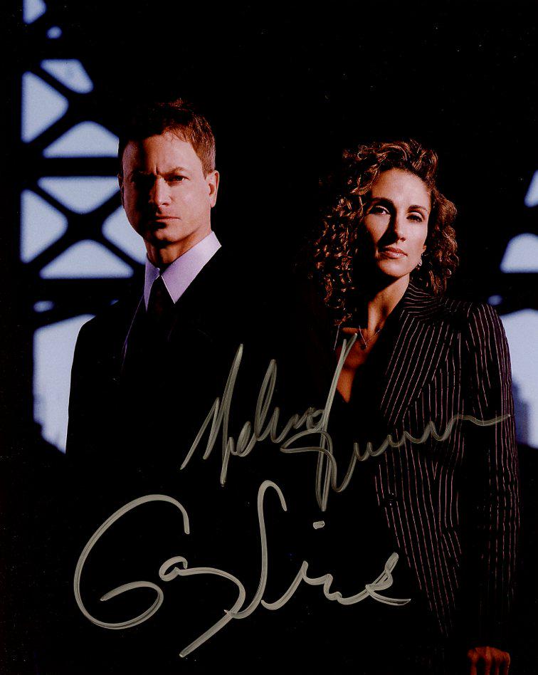 Gary Sinise / Melina Kanakaredes CSI NEW YORK In Person Signed Photo: Photo size is 8x10. Gary Sinise / Melina Kanakaredes in person signed photo from the TV series CSI:NY. Gary Sinise as the character Mac Taylor. Melina Kanakaredes as the character Stella Bonasera.