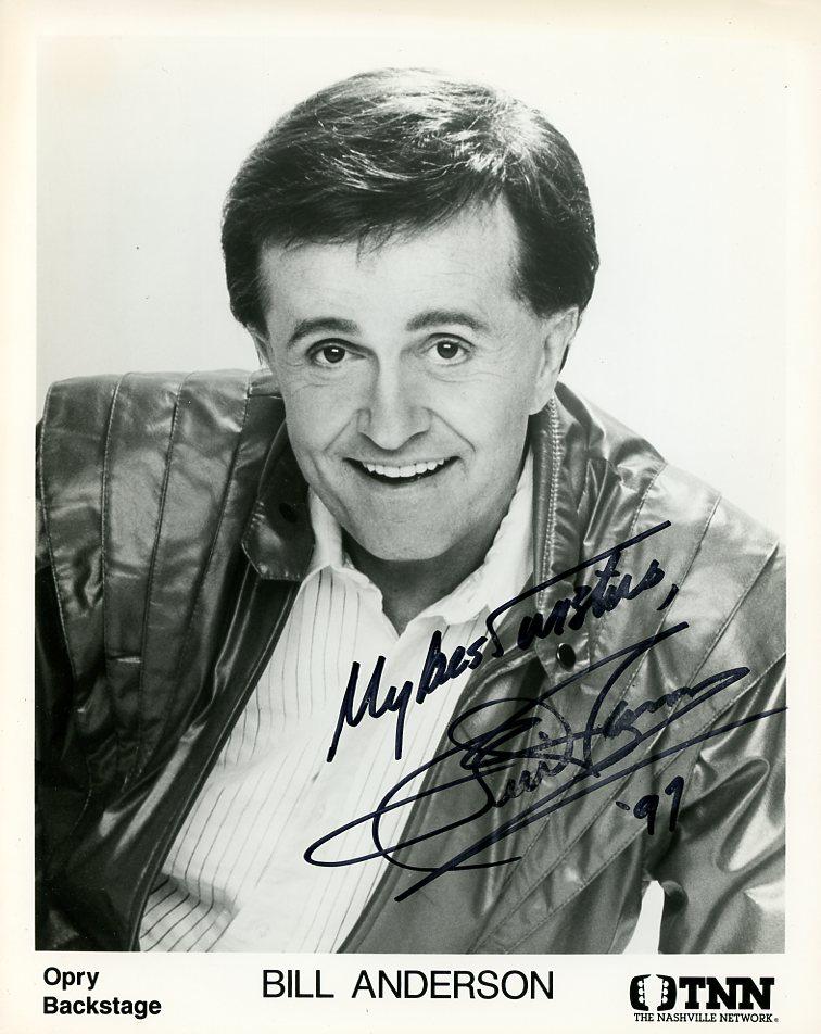 Bill Anderson COUNTRY MUSIC In Person Signed Photo: Photo size is 8x10. Bill Anderson in person signed photo. Bill Anderson, is an American country music singer, songwriter, and television host. His soft-spoken singing voice was given the nickname "Whi