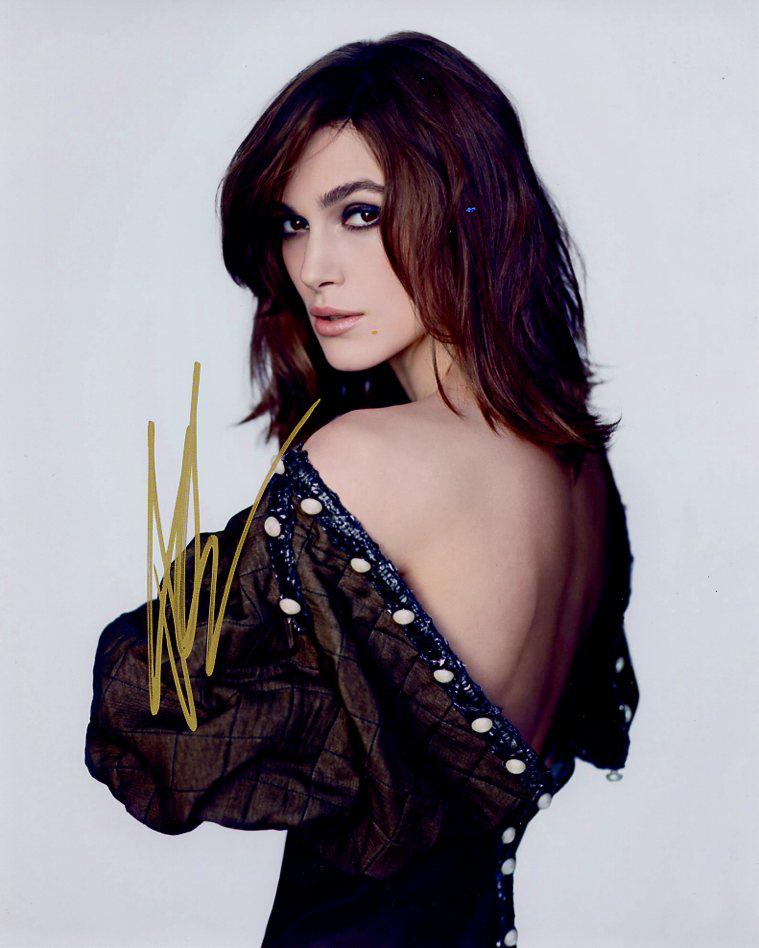 Kiera Knightley PIRATES / KING ARTHUR In Person Signed Photo: Photo size is 8x10. Kiera Knightley in person signed autographed photo. Kiera Knightley has been in such movies as PIRATES OF THE CARIBBEAN, THE NUTCRACKER AND THE FOUR REALMS, and KING ARTHUR