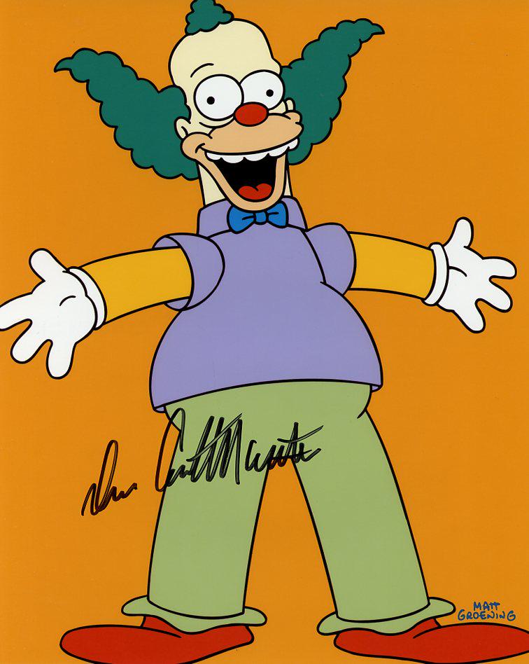 Dan Castellaneta THE SIMPSONS In Person Signed Photo: Photo size is 8x10. Dan Castellaneta in person signed photo from the TV series THE SIMPSONS. Dan Castellaneta as the voice character of Krusty the Clown.
