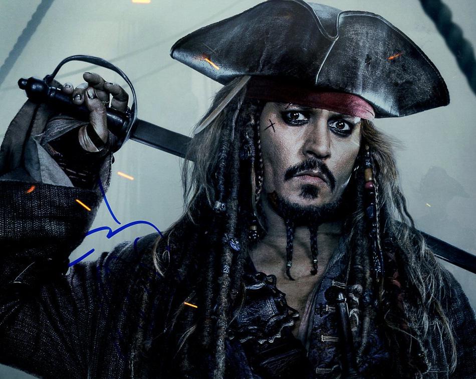 Johnny Depp PIRATES OF THE CARIBBEAN Person Signed Photo (1 of 1)
