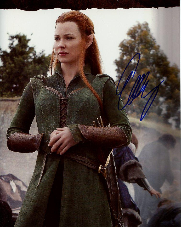 Evangeline Lilly THE HOBBIT In Person Autographed Photo: Photo Size is 8x10. Evangeline Lilly in person signed autographed photo from the movie THE HOBBIT. Evangeline Lilly as the character Tauriel.