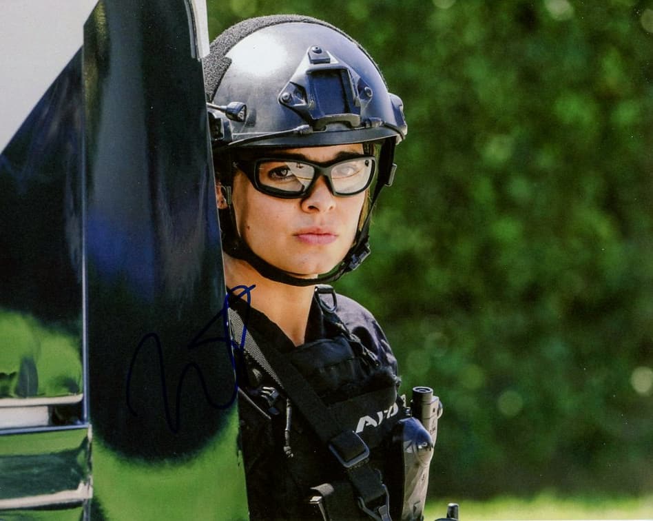 Linda Esco SWAT In Person Sign Photo: Photo size is 8x10. Linda Esco in person sign photo from the TV series SWAT. Linda Esco as the character Officer Chris Alonso.
