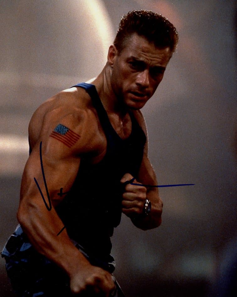 Jean-Claude Van Damme STREET FIGHTER In Person Signed Photo: Photo size is 8x10. Jean-Claude Van Damme in person signed photo from the movie STREET FIGHTER. Jean Claude Vnd Damme as the character Colonel Guile.
