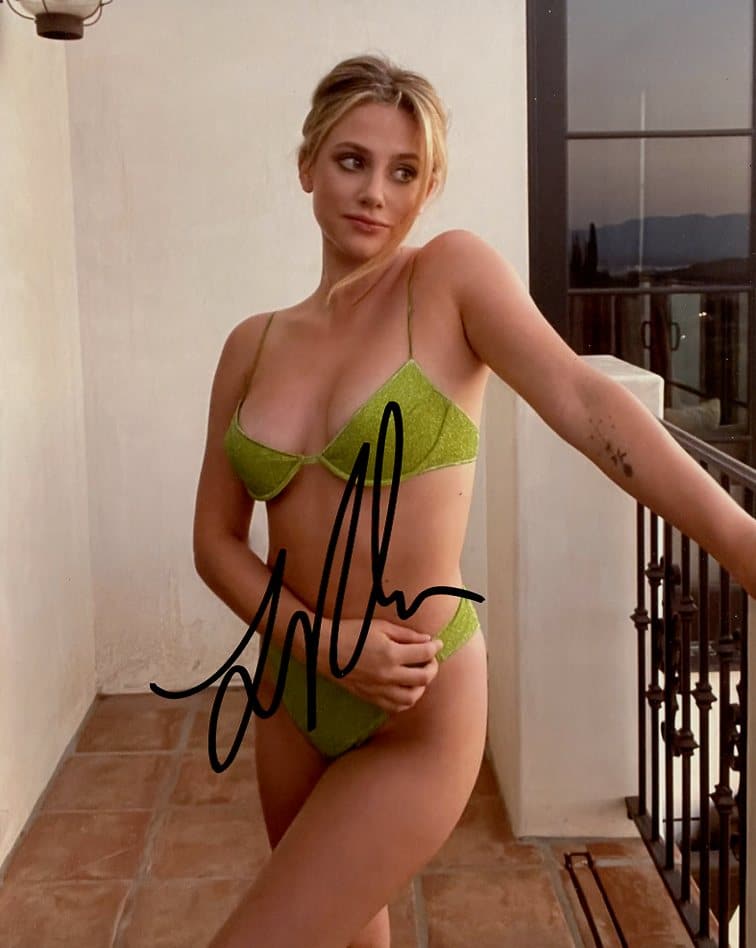 Lily Reinhart RIVERDALE / HUSTLERS In Person Signed Photo: Photo size is 8x10. Lily Reinhardt in person signed autographed photo. Lily Reinhart is best known for her role as Betty Cooper and TVs RIVERDALE. She has also appeared in CHEMICAL HEARTS and CHARLIE'