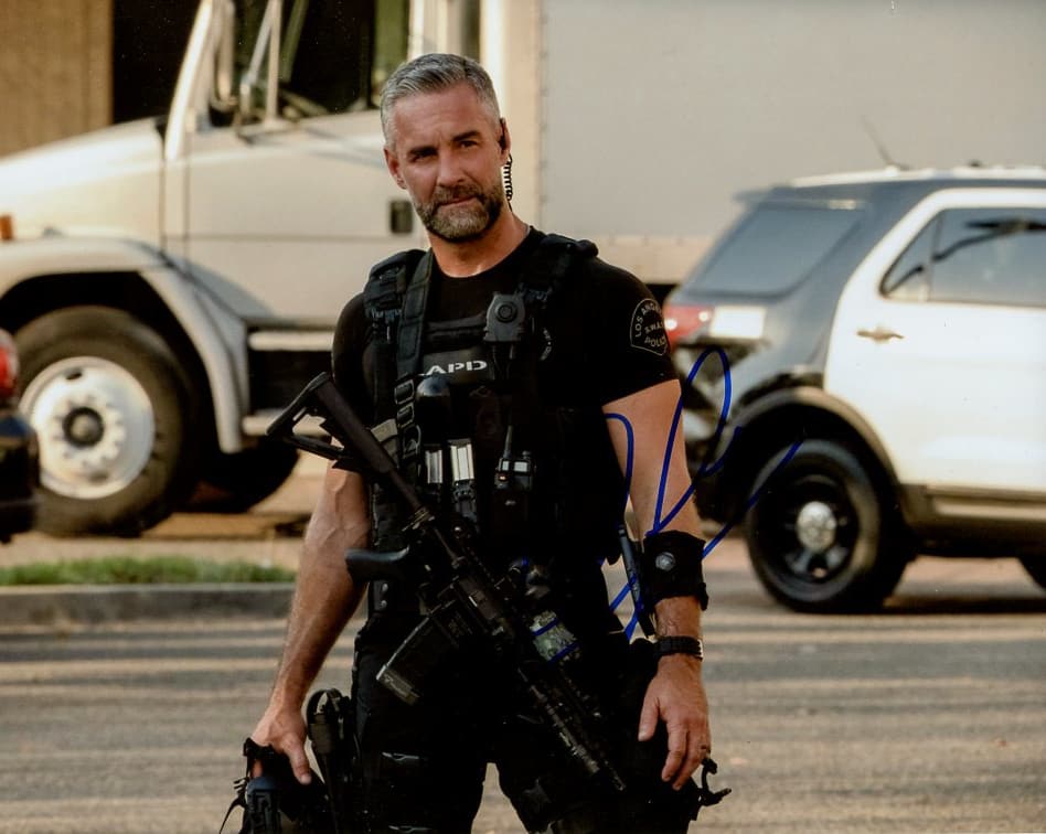 Jay Harrington SWAT In Person Signed Photo: Photo size is 8x10. Jay Harrington in person signed photo from the TV series SWAT. Jay Harrington as the character Sgt. David "Decon" Kay.