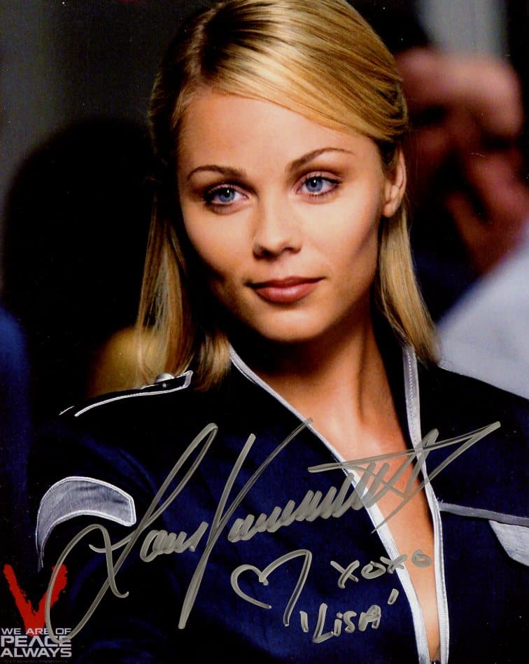 Laura Vandervoort V In Person Signed Photo: Photo size is 8x10. Laura Vandervoort in person signed photo from the TV series "V". Laura Vandervoort as the character Lisa.
