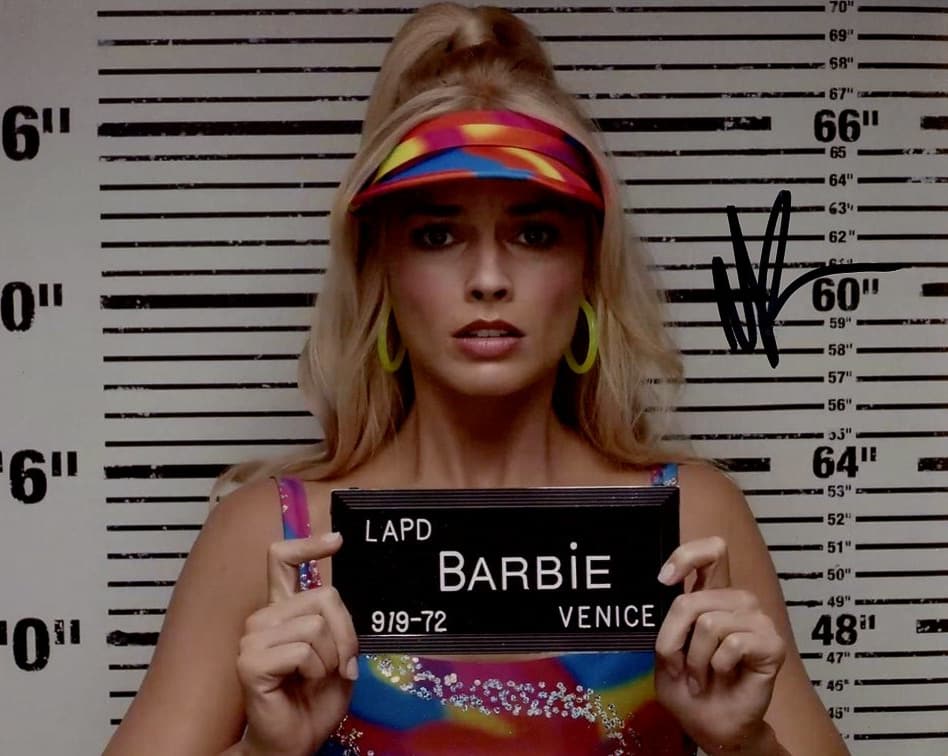 Margot Robbie BARBIE In Person Signed Photo: Photo size is 8x10. Margot Robbie in person signed photo from the movie BARBIE. Margot Robbie as the character Barbie.