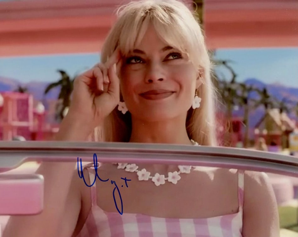 Margot Robbie BARBIE In Person Signed Photo: Photo size is 8x10. Margot Robbie in person signed photo from the movie BARBIE. Margot Robbie has the character Barbie.