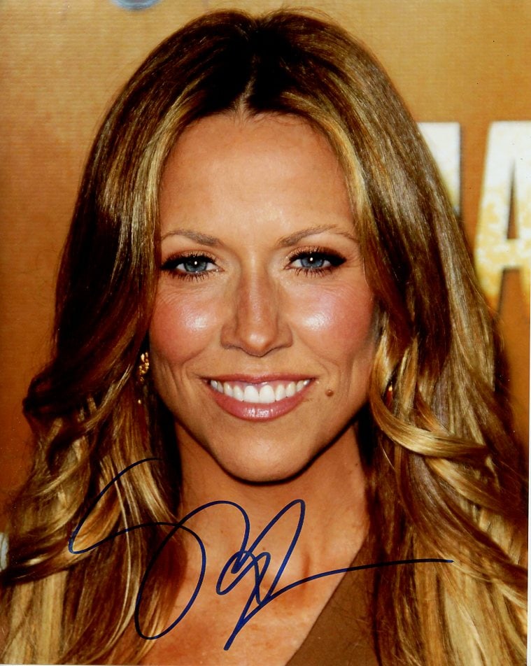 Sheryl Crow MUSICIAN In Person Signed Photo: Photo size is 8x10. Sheryl Crow beautiful in person signed autographed photo. Sheryl Crow is an American musician, singer, songwriter and actress. Her music incorporates elements of pop, rock, country