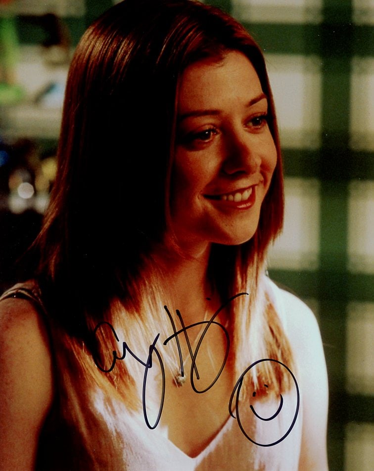 Alyson Hannigan AMERICAN WEDDING In Person Signed Photo: Photo size is 8x10. Alyson Hannigan in person signed photo from the movie AMERICAN WEDDING. Alyson Hannigan as the character Michelle Flattery.