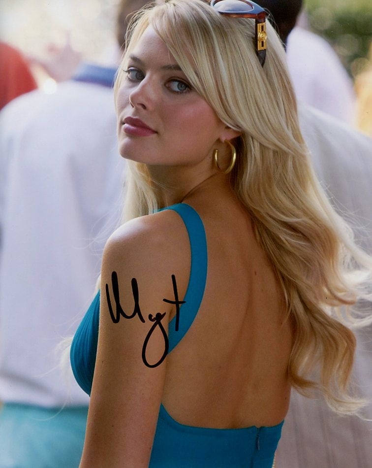 Margot Robbie WOLF WALL ST In Person Signed Photo: Photo size is 8x10. Margot Robbie in person signed photo from the movie THE WOLF OF WALL STREET. Margot Robbie as the character Naomi Lapaglia.