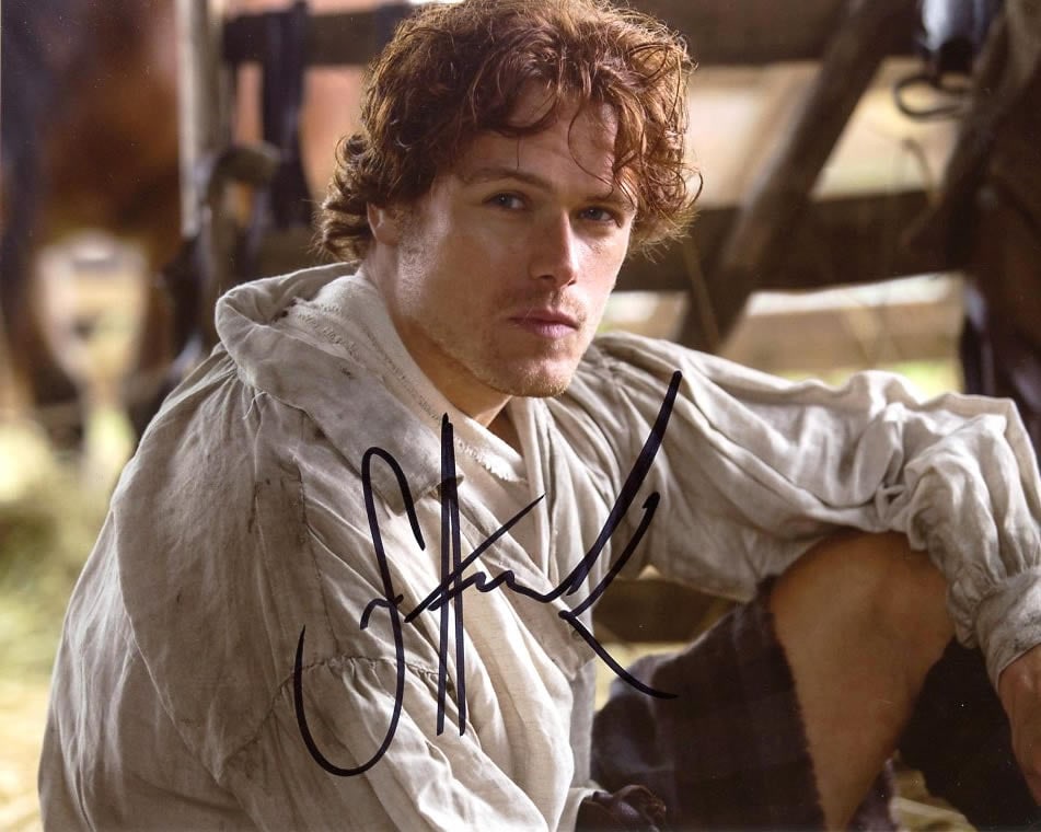 Sam Heughan OUTLANDER In Person signed Photo: Photo size is 8x10. Sam Heughan in person signed photo from the TV series OUTLANDER. Sam Heughan as the character Jamie Fraser.