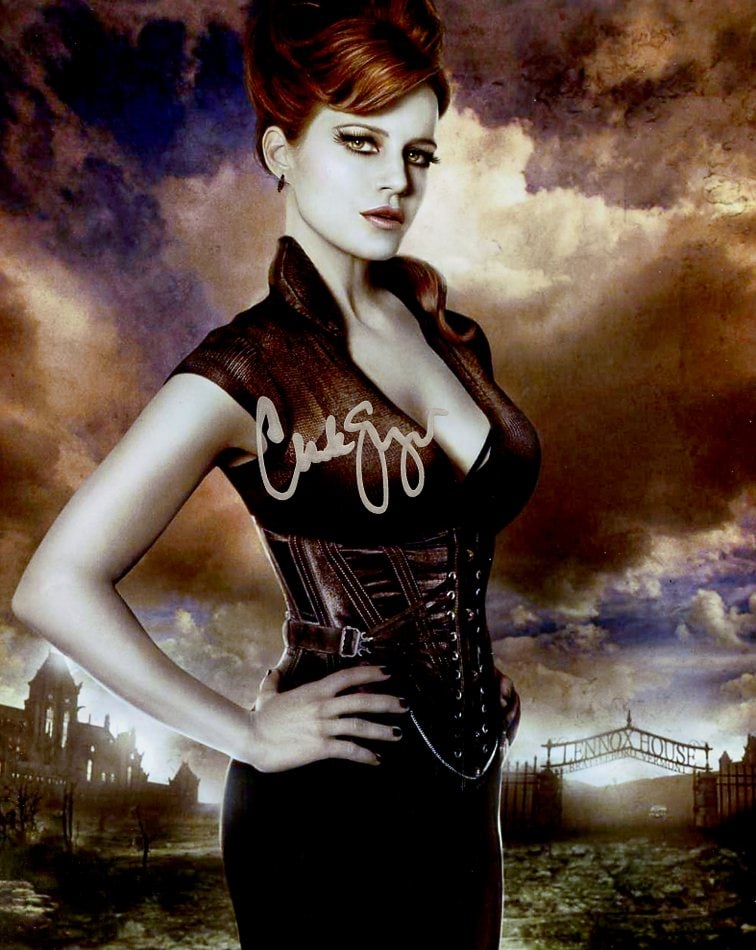 Carla Gugino SUCKER PUNCH In Person Signed Photo: Photo size is 8x10. Carla Gugino in person signed photo from the movie SUCKER PUNCH. Carla Gugino as the character Dr vera Gorski.