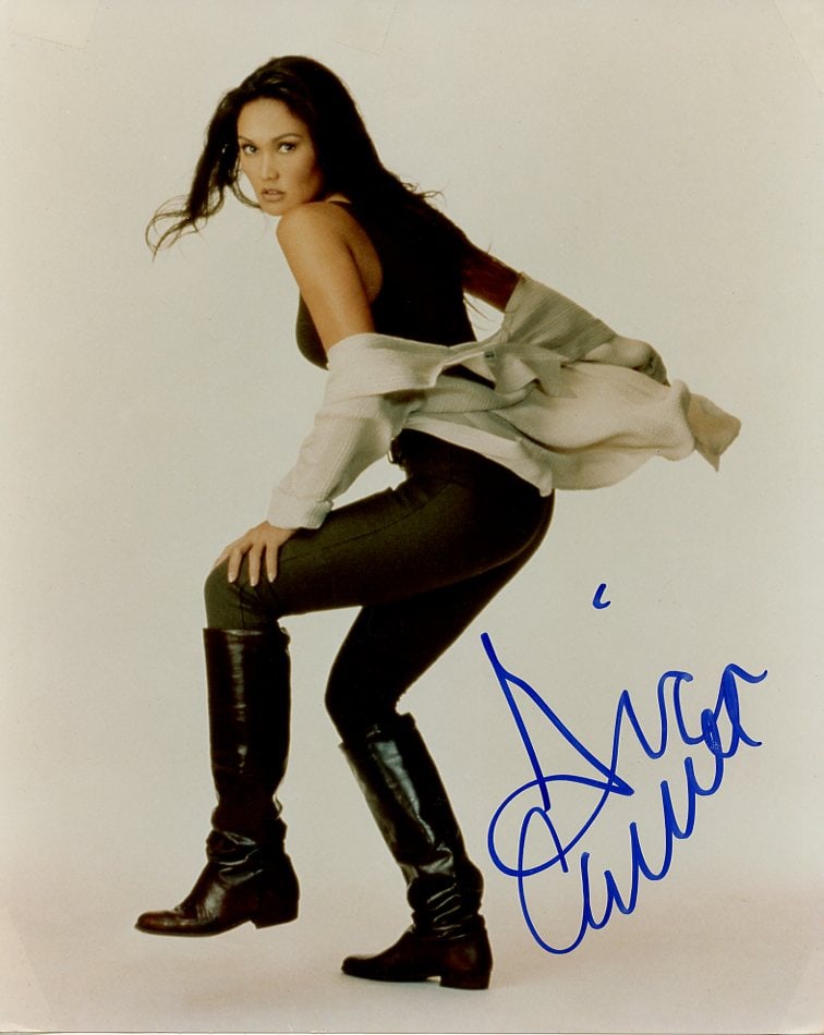 Tia Carrere THE RELIC HUNTER / WAYNE'S WORLD In Person Signed Photo: Photo size is 8x10. Tia Carrere in person signed photo. Tia Carrere has done such movies as THE RELIC HUNTER, WAYNE'S WORLD, and TRUE LIES.