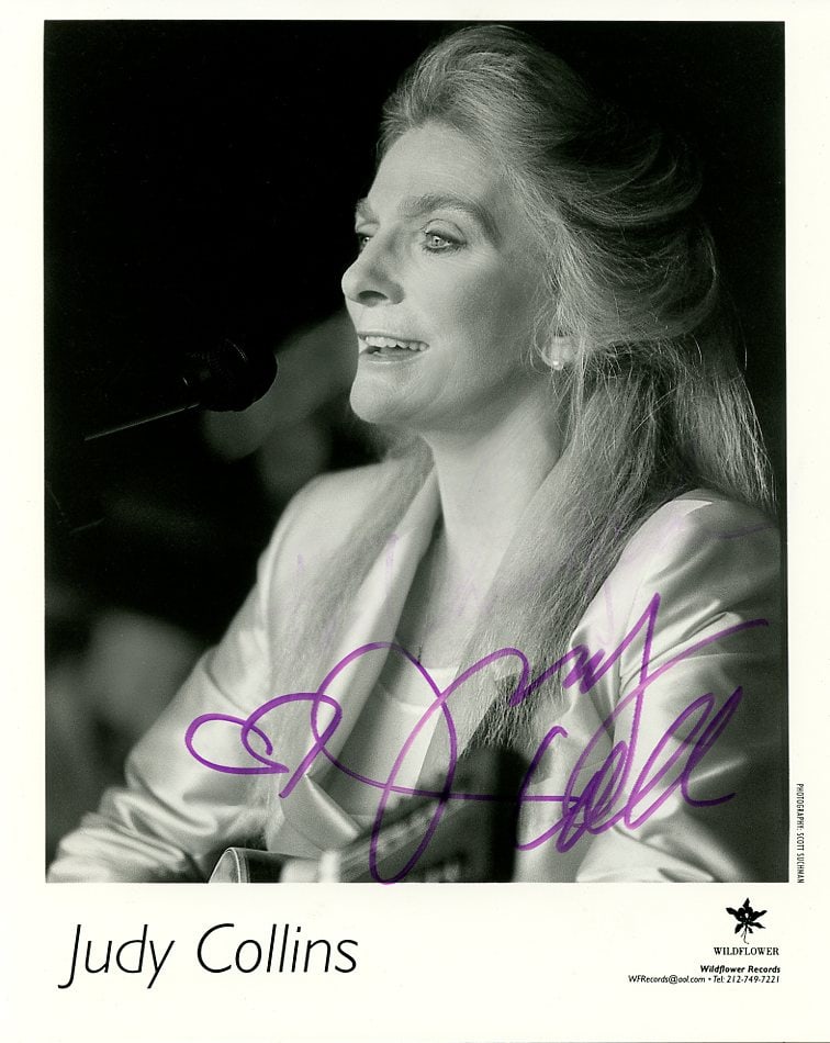 Judy Collins SINGER In Person Signed Photo: Photo size is 8x10. Judy Collins in person signed photo. Judy Collins is an American singer-songwriter and musician with a career spanning seven decades.