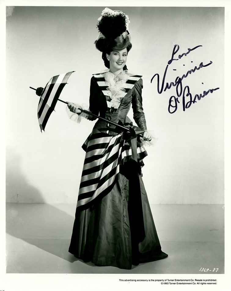 Virginia O'Brien (1919-2001) MEET THE PEOPLE / LADY BE GOOD Signeded Photo: Photo size is 8x10. Virginia O'Brien (1919-2001) beautiful Signeded photo. Virginia O'Brien has done such movies as MEET THE PEOPLE, THE HARVERY GIRLS, AND FRANCIS IN THE NAVY.