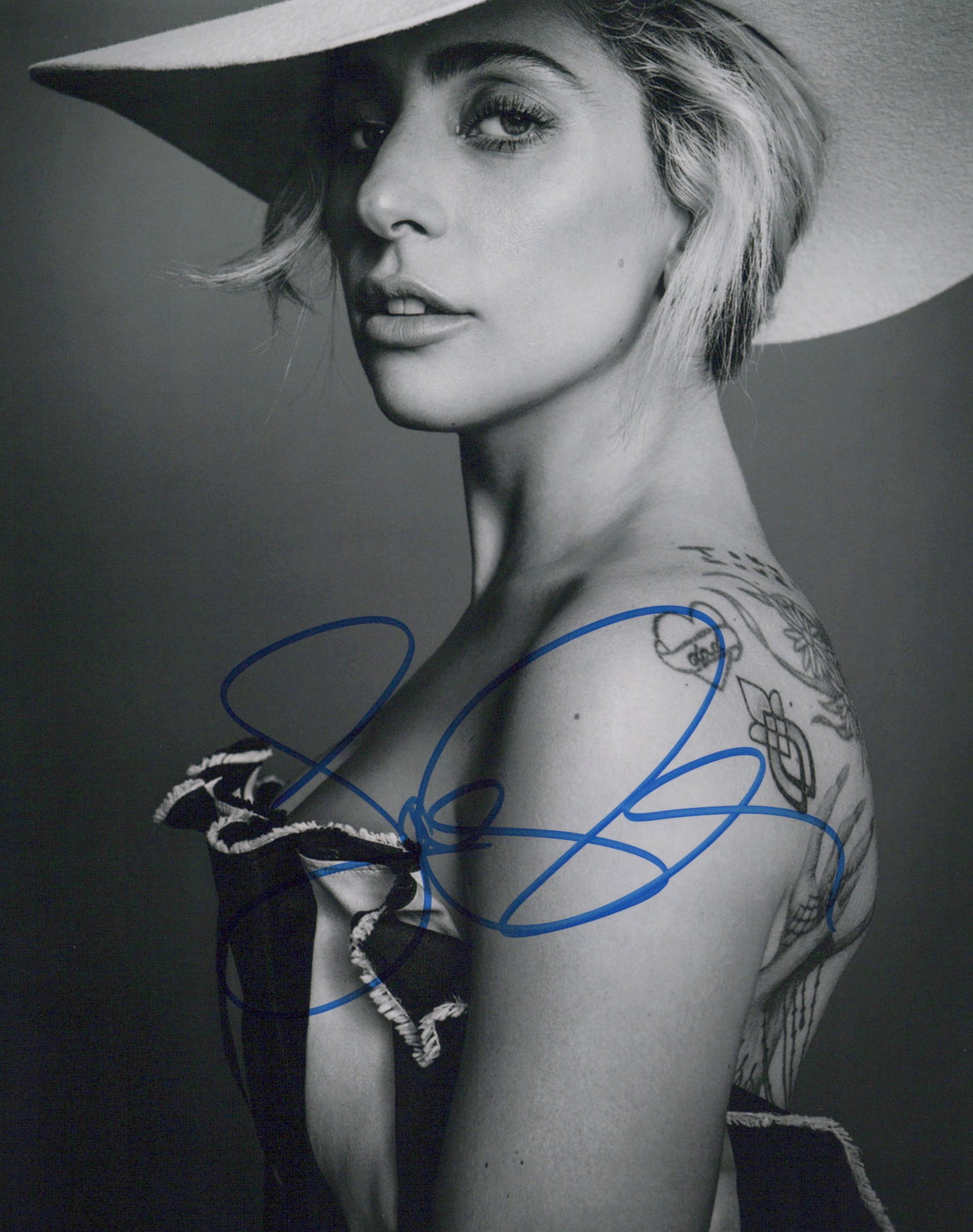 Lady Gaga POP SUPERSTAR In Person Signed Photo: Photo size is 8x10. Lady Gaga in person signed autographed photo. Stefani Joanne Angelina Germanotta, known professionally as Lady Gaga, is an American singer, songwriter, and actress. She is known fo
