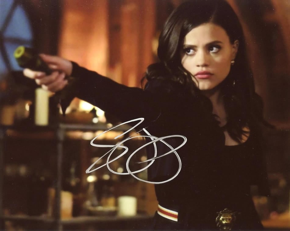 Sarah Jeffrey CHARMED In Person Signed Photo: Photo size is 8x10. Sarah Jeffrey in person signed autographed photo from the TV series CHARMED. Sarah Jeffrey as the character Maggie Vera