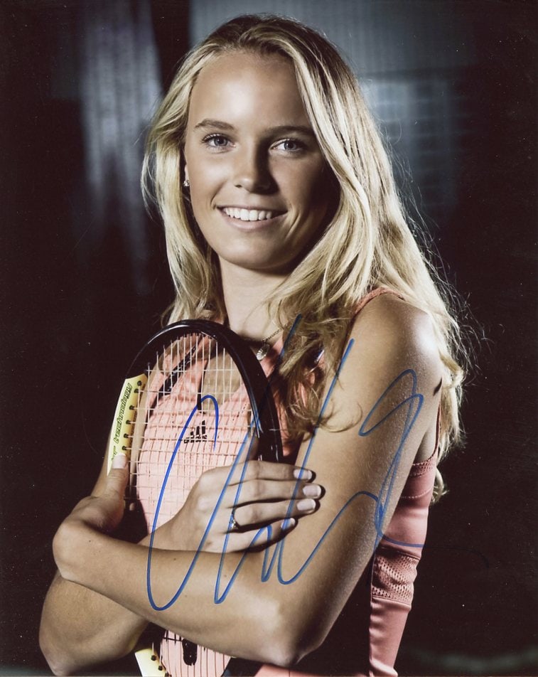 Caroline Wozniacki TENNIS In Person Signed Photo: Photo size is 8x10. Caroline Wozniacki in person signed autographed photo. Caroline Wozniacki is a Danish former professional tennis player. She was ranked world No. 1 in singles for a total of 71 wee