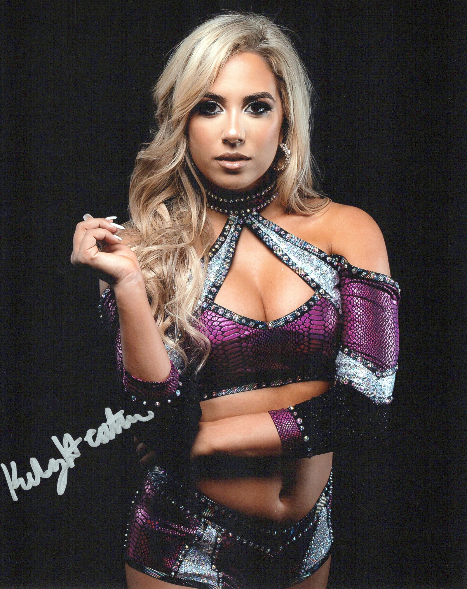 Kelsey Heather SEXY / WOMEN OF WRESTLING In Person Signed Photo: Photo size is 8x10. PRIVATE SIGNING. Kelsey Heather in person signed photo. Kelsey Heather Hornack (August 24, 1988) is an American professional wrestler, cheerleader and cheerleading coach signed to 
