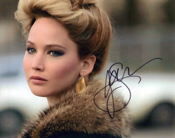 Jennifer Lawrence AMERICAN HUSTLE In Person Signed: Photo size is 8x10. Jennifer Lawrence in person signed autographed photo from the movie AMERICAN HUSTLE. Jennifer Lawrence as the character Rosalynn Rosenfeld