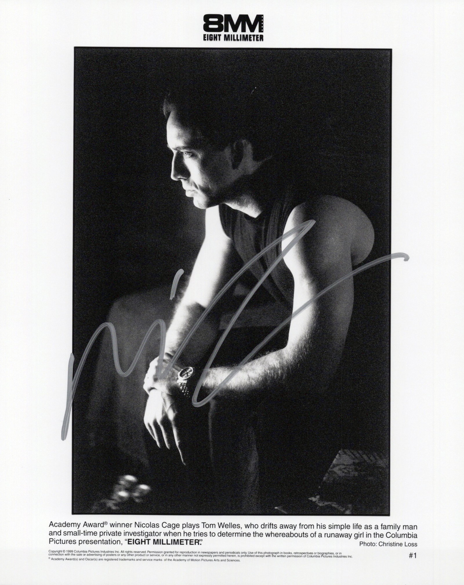 Nicholas Cage 8MM Signed Photo: Photo size is 8x10. Nicolas Cage signed photo from the movie 8 MM. Nicolas Cage as the character Tom Welles.