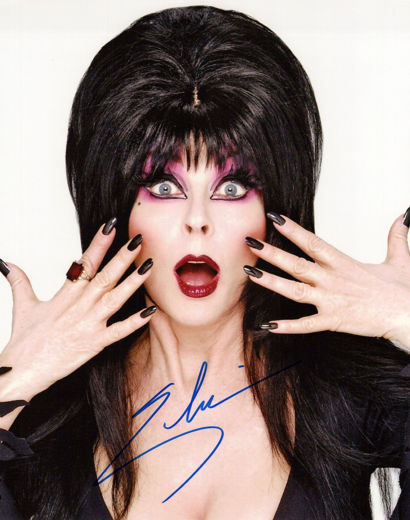 Elvira MISTRESS OF THE DARK In Person Signed Photo: Photo size is 8x10. PRIVATE SIGNING. Elvira in person signed autographed photo. Cassandra Peterson is an American actress, writer, and singer. She is best known for her portrayal of the horror hostess