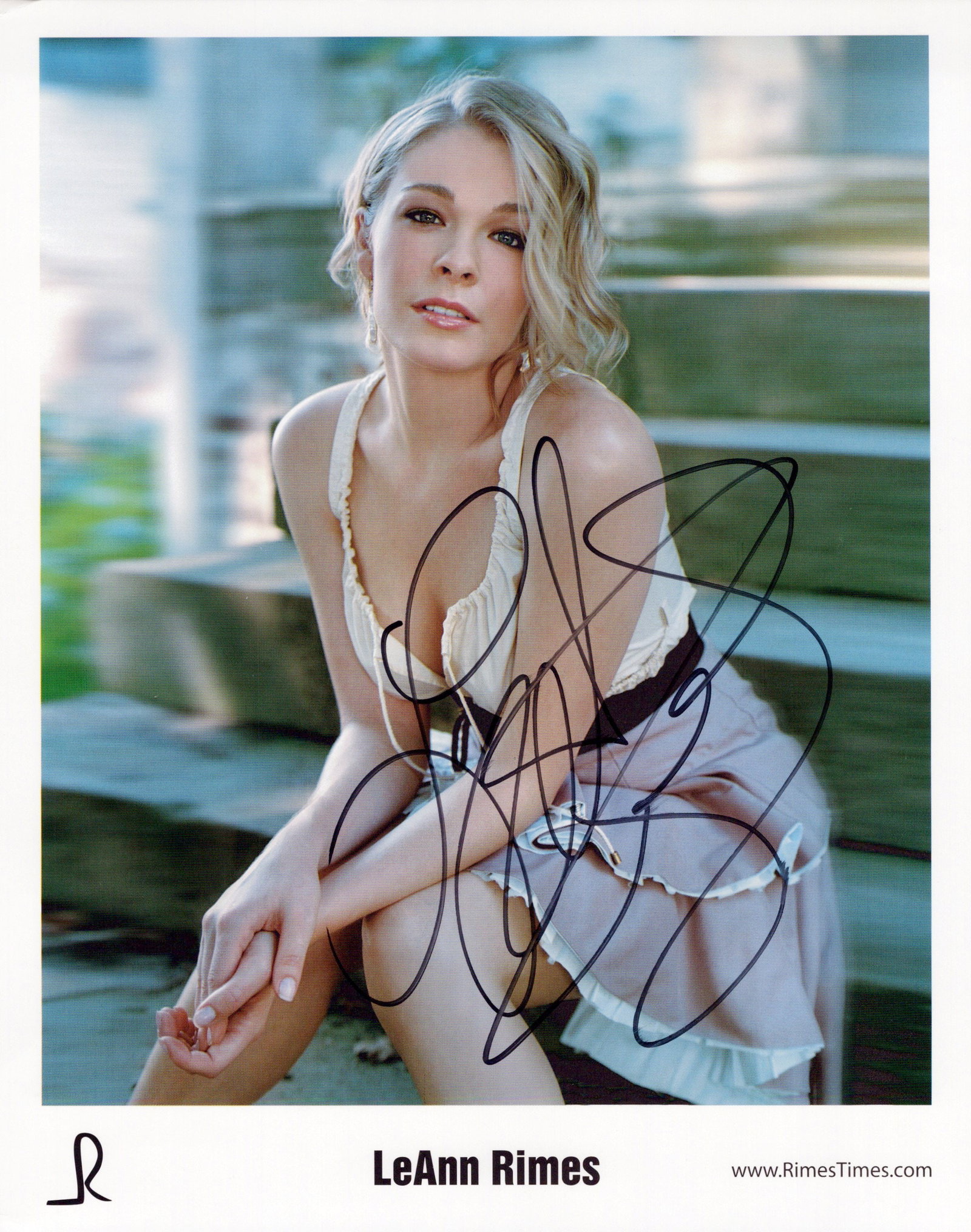 LeeAnn Rimes SINGER In Person Signed Photo: Photo size is 8x10. LeeAnn Rimes in person signed photo. LeeAnn Rimes is an American singer, songwriter and actress. She originally rose to success as a country music artist at the age of 13 and has s