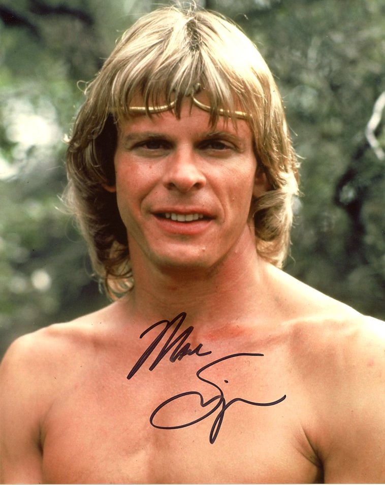 Marc Singer BEASTMASTER In Person Signed Photo: Photo size is 8x10. Marc Singer in person signed autographed photo from the movie BEAST MASTER. Marc Singer as the character Dar