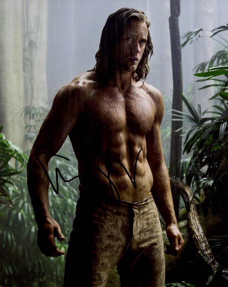 Alexander Skarsgard LEGEND OF TARZAN In Person Signed Photo: Photo size is 8x10. Alexander Skarsgard in person signed autographed photo from the movie THE LEGEND OF TARZAN. Alexander Skarsgard as the character John Clayton / Tarzan.