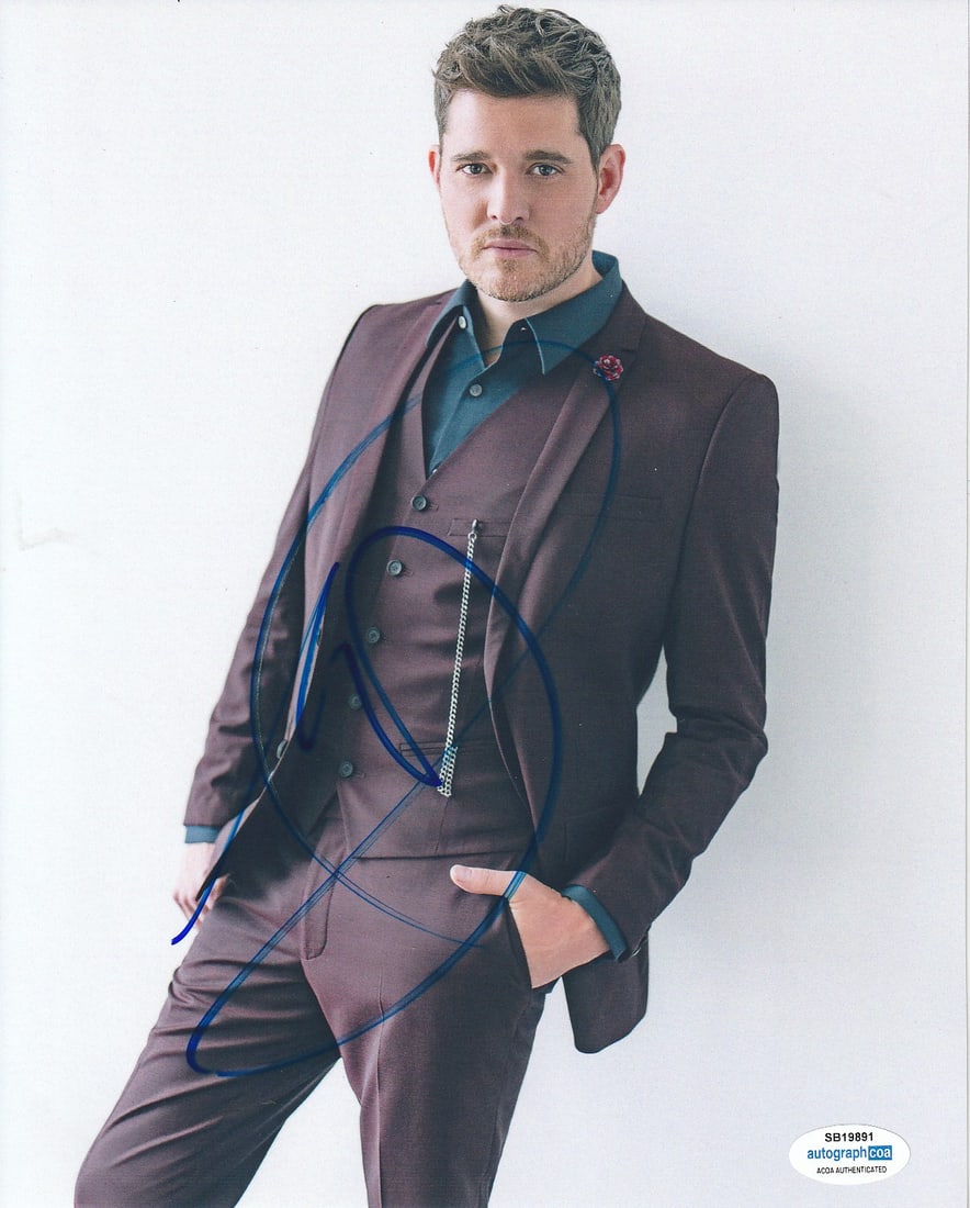 Michael Buble SINGER In Person Signed Photo: Photo size is 8x10. Michael Buble in person signed photo. Michael Buble is a Canadian singer and songwriter known for his smooth vocals and modern takes on classic jazz and pop. He's sold more than 75