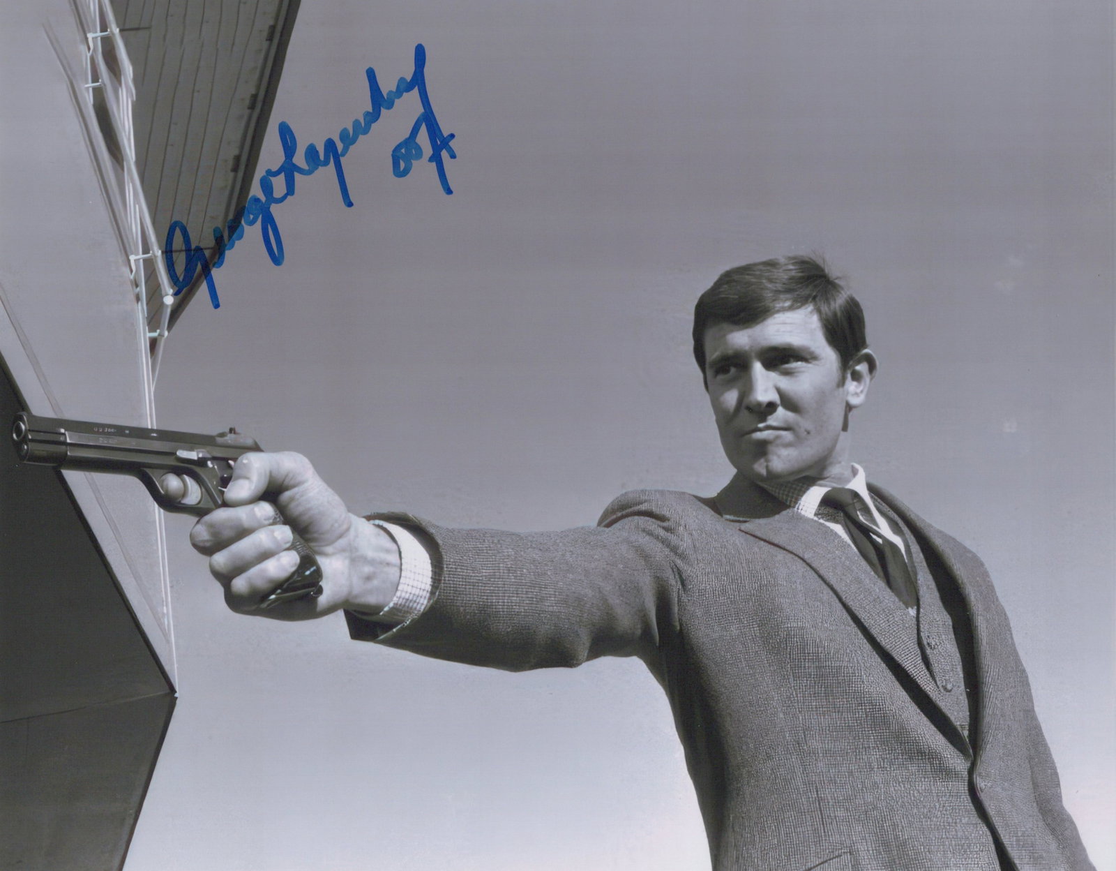 George Lazenby JAMES BOND In Person Signed Photo: Photo size is 8x10. PRIVATE SIGNING. George Lazenby in person signed autographed photo from the movie ON HER MAJESTY'S SECRET SERVICE. George Lazenby as the character James Bond / 007