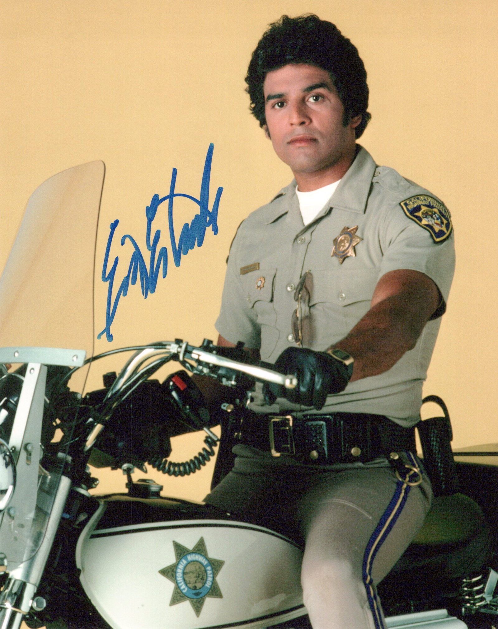 Erik Estrada CHIPS In Person Signed Photo: Photo size is 8x10. PRIVATE SIGNING. Erik Estrada in person signed photo from the TV series CHIPS. Erik Estrada as the character Officer Frank Poncherello