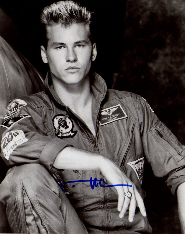 Val Kilmer (1959-2025) TOP GUN IN Person Signed Photo: Photo size is 8x10. Val Kilmer (1959-2025) in person signed photo from the movie TOP GUN. Val Kilmer as the character Ice.