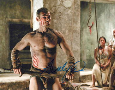 Andy Whitfield (1971-2011) SPARTACUS In Person Signed Photo: Photo size is 8x10. Andy Whitfield (1971-2011) in person signed photo from the TV series SPARTACUS. Andy Whitfield as the character Spartacus.