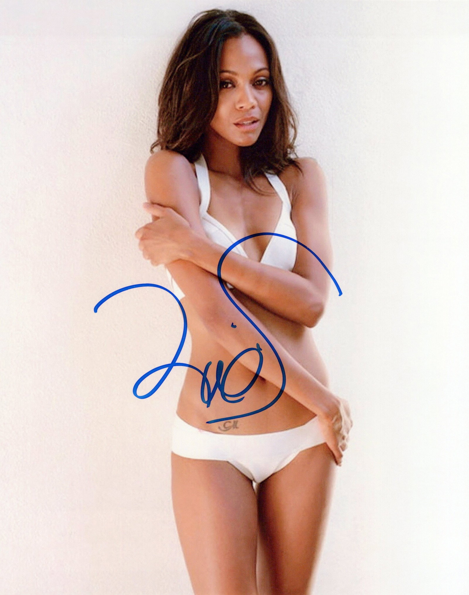 Zoe Saldana SEXY In Person Signed Photo: Photo size is 8x10. Zoe Saldana in person signed autographed photo. Zoe Saldana has done such TV and movies as STAR TREK, GUARDIANS OF THE GALAXY, and Avatar.