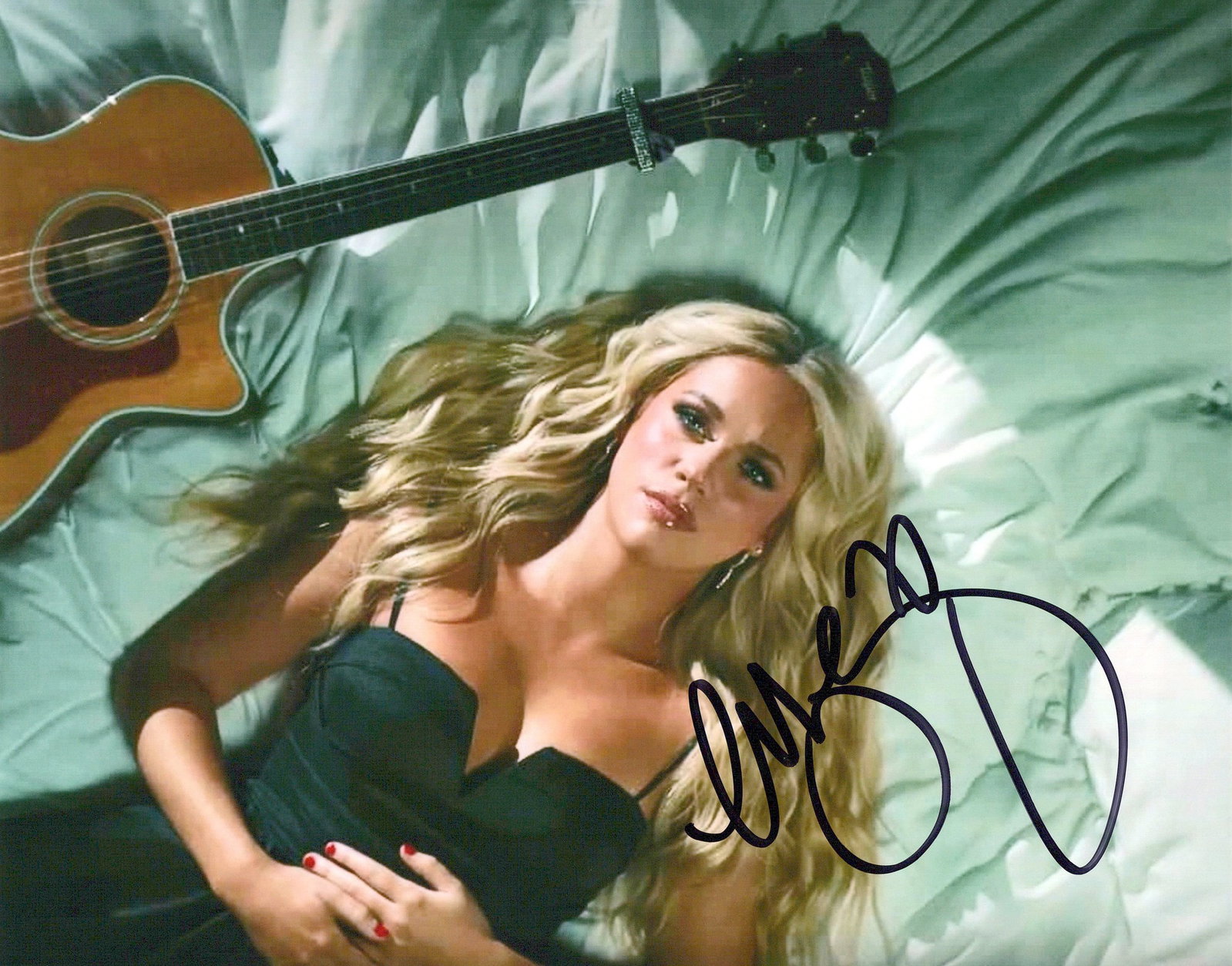 Megan Morony COUNTRY SINGER In Person Signed Photo: Photo size is 8x10. Megan Morony in person signed photo. Megan Moroney is an American country music singer and songwriter from Douglasville, Georgia. She charted her second single, "Tennessee Orange",