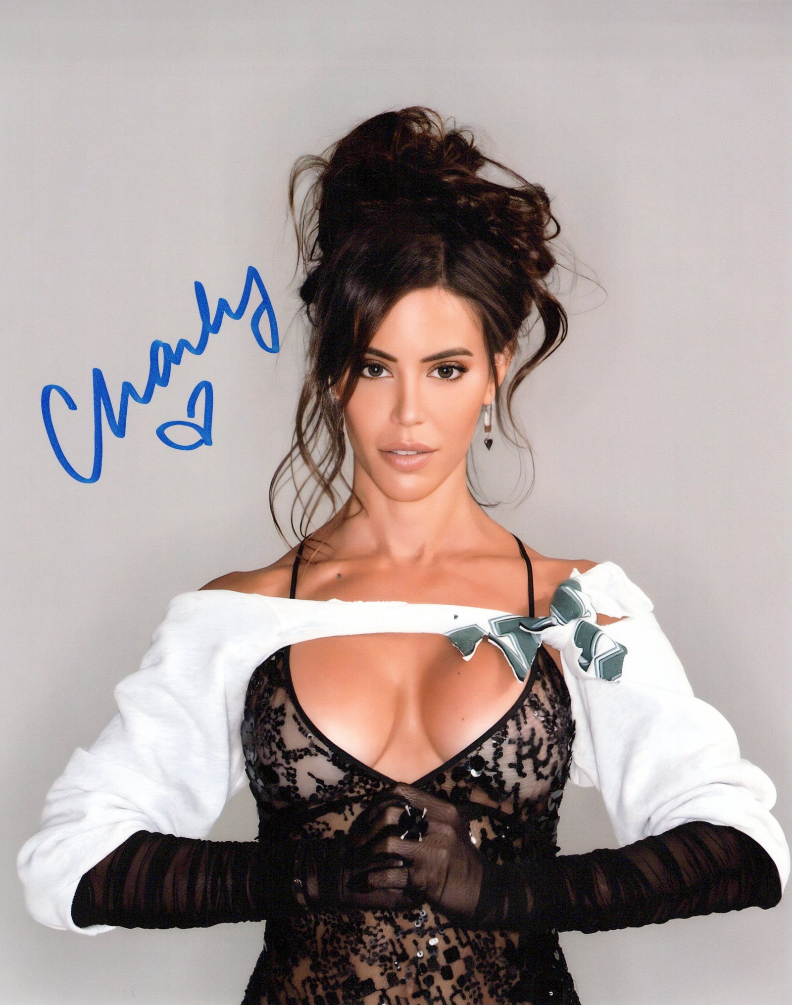 Charly Arnolt WWE In Person Signed Photo: Photo size is 8x10. PRIVATE SIGNING. Charly Arnolt in person signed photo. Charly Arnolt is an American sportscaster and television personality for OutKick, where she covers sports, news, politics, an