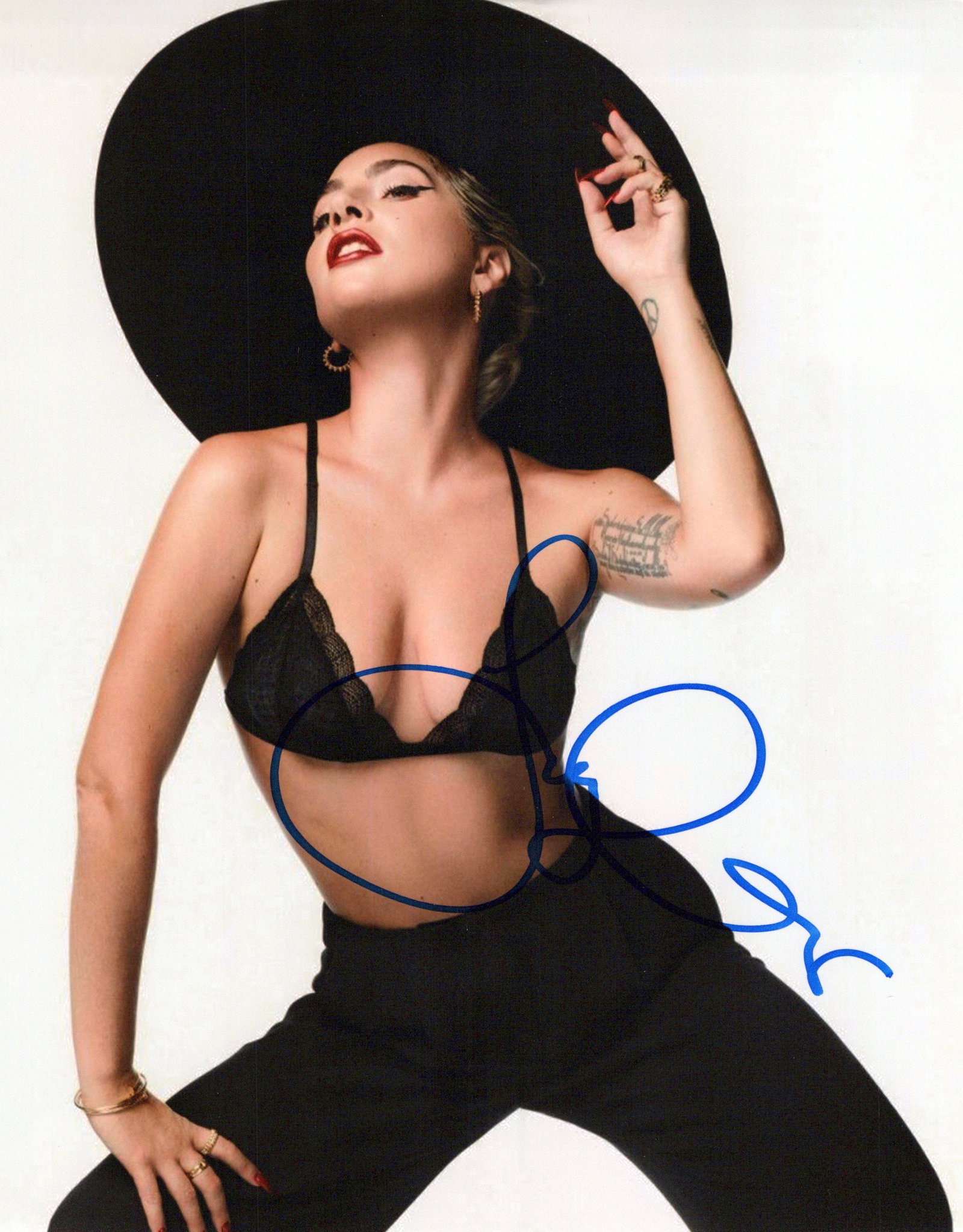 Lady Gaga POP SUPERSTAR In Person Signed Photo: Photo size is 8x10. Lady Gaga in person signed autographed photo. Stefani Joanne Angelina Germanotta, known professionally as Lady Gaga, is an American singer, songwriter, and actress. She is known fo