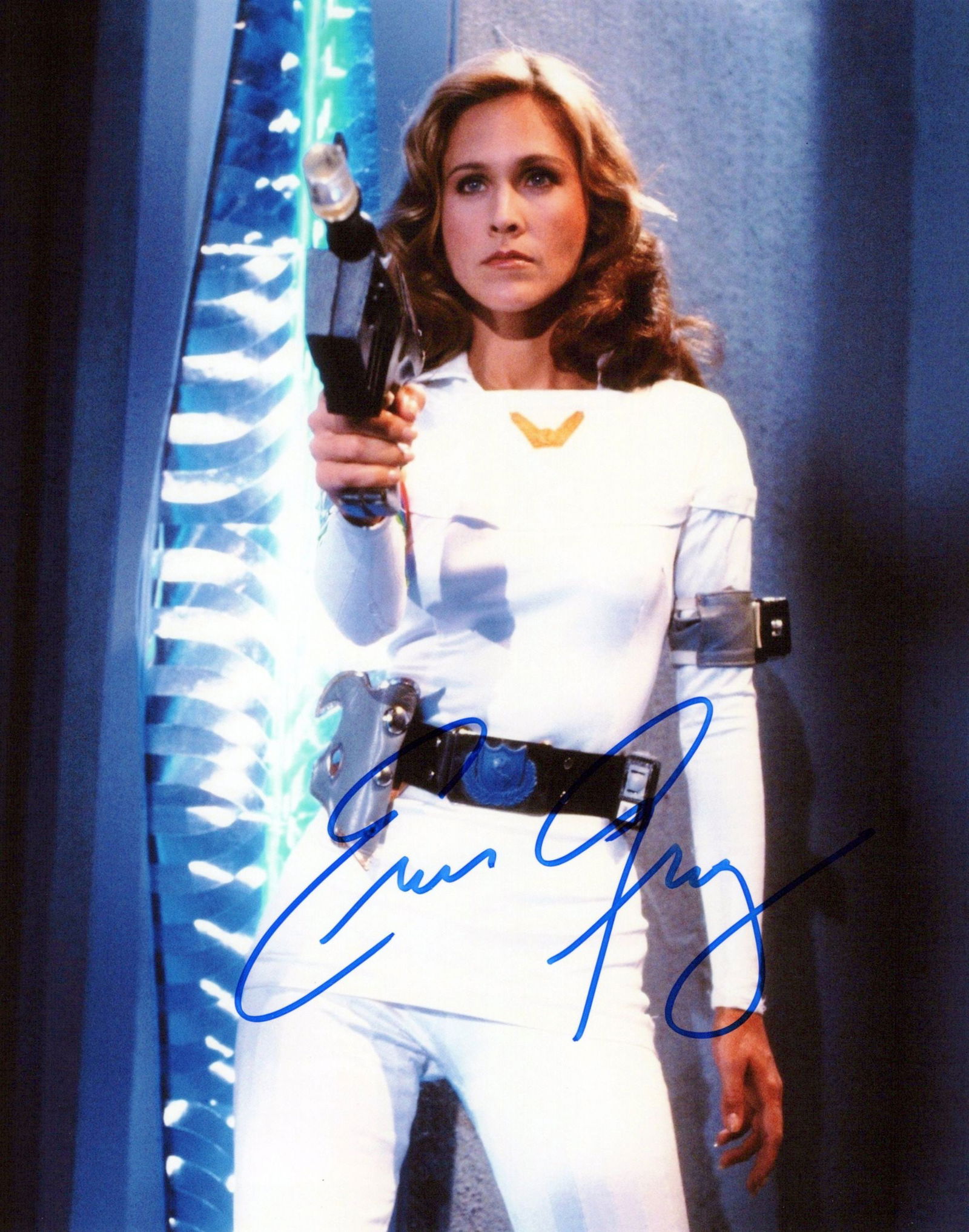 Erin Gray BUCK ROGERS In Person Signed Photo: Photo size is 8x10. Erin Gray in person signed photo from the TV series BUCK ROGERS IN THE 25TH CENTURY. Erin Gray as the character Wilma Dearing.
