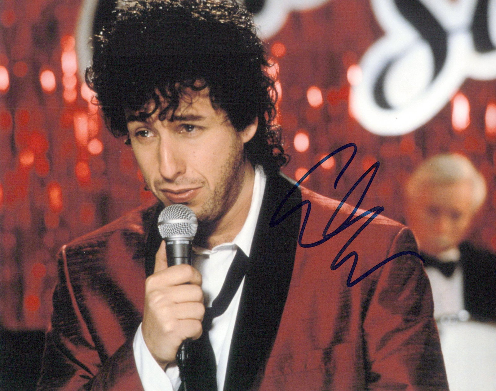Adam Sandler WEDDING SINGER In Person Signed Photo: Photo size is 8x10. Adam Sandler in person signed photo from the movie THE WEDDING SINGER. Adam Sandler as the character Robbie Hart