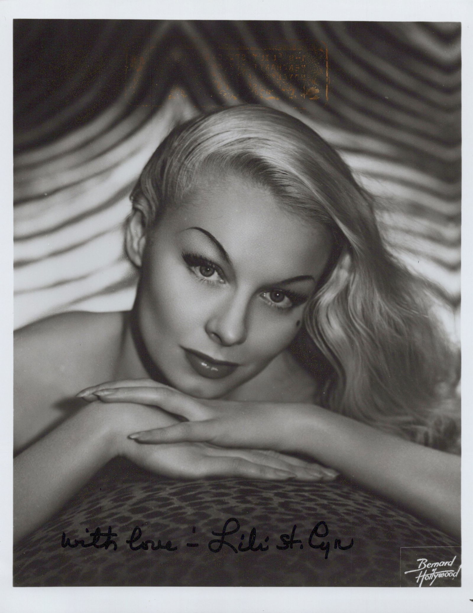 Lili St Cyr (1918-1999) STUNNING Signed Photo: Photo size is 8x10. Lili St Cyr (1918-1999) gorgeous signed photo. Lili St Cyr has done such movies as SON OF SINBAD, CINDERELLA'S LOVE LESSON and RUNAWAY GIRL.