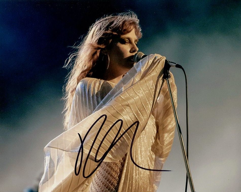 Riley Keough DAISY JONES & THE 6 In Person Signed Photo: Photo size is 8x10. Riley Keough in person signed photo from the Series DAISY JONES ND THE SIX. Riley Keough as the character Daisy Jones.