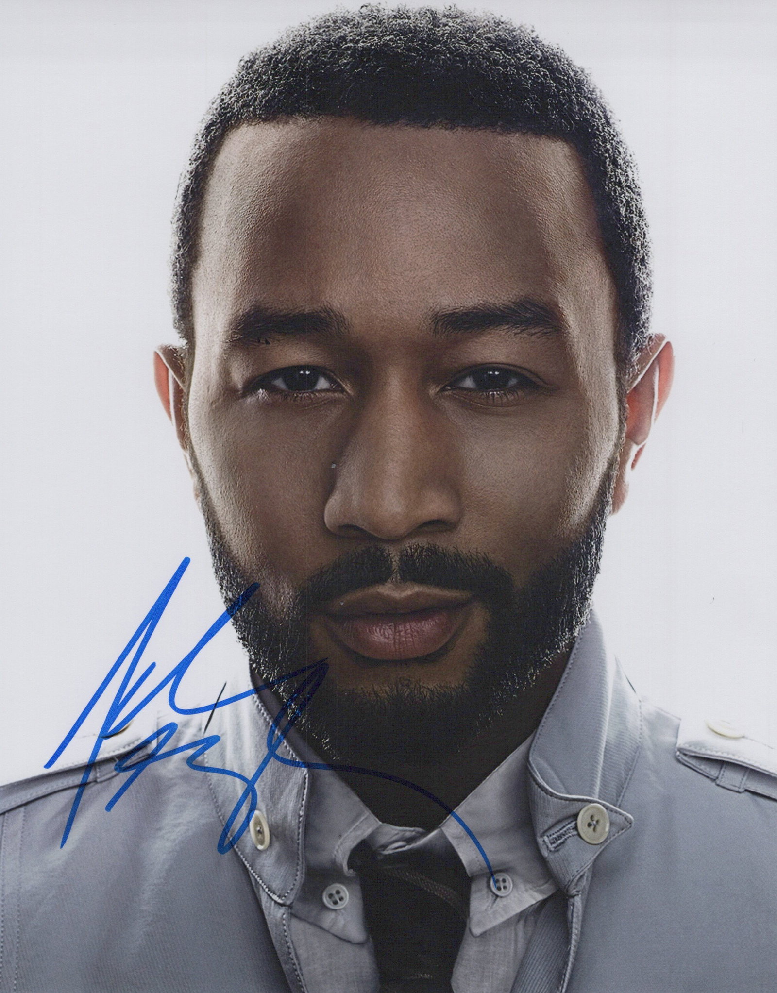 John Legend SINGER In Person Signed Photo: Photo size is 8x10. John Legend in person signed photo. John Legend is an American singer, songwriter, and pianist who blends R&B and soul. He found success in the early 2000s and has won 13 Grammys. 