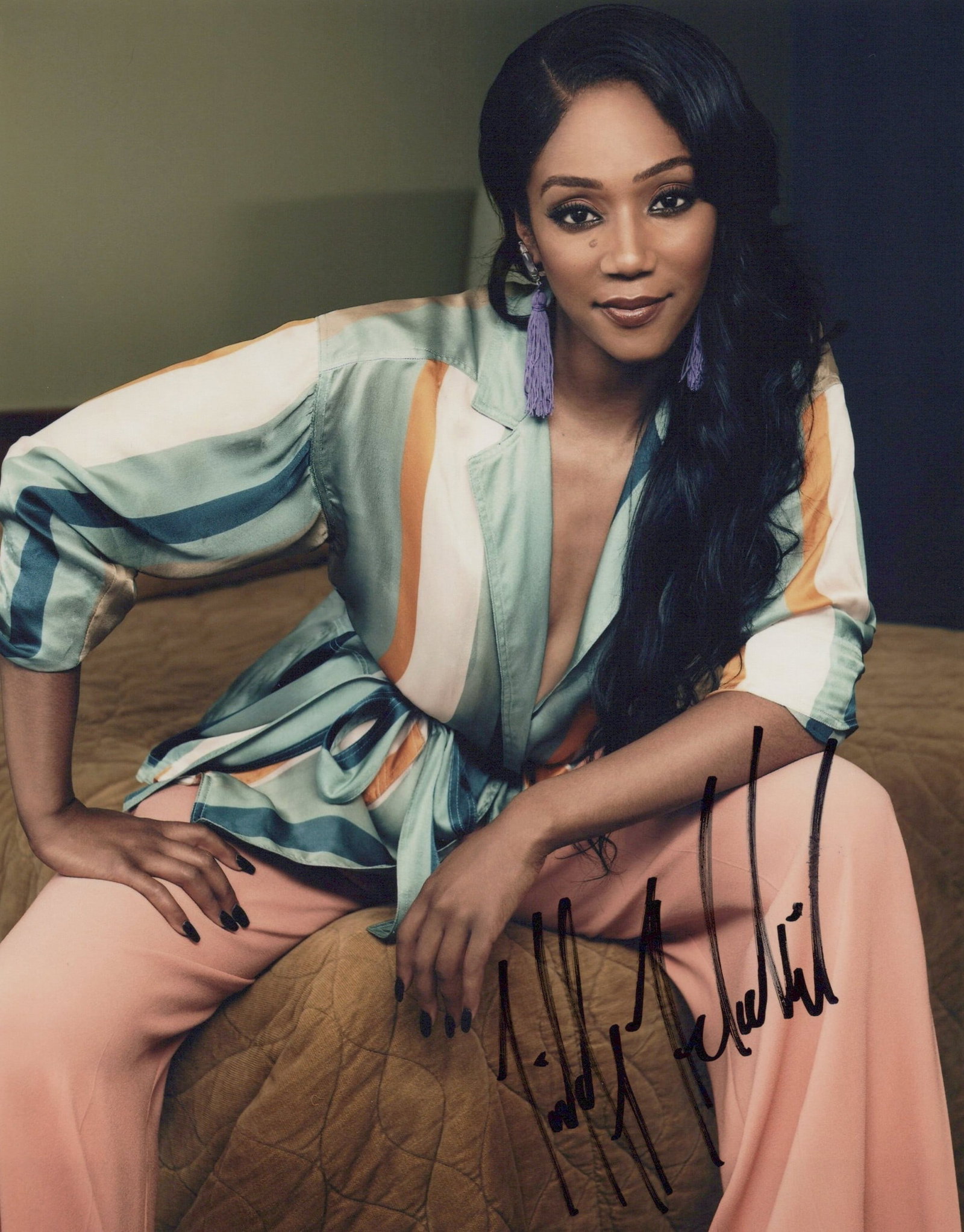Tiffany Haddish GIRL STRIP / THE AFTER PARTY In Person Signed Photo: Photo size is 8x10. Tiffany Haddish in person signed photo. Tiffany Haddish has done such TV and movies as GIRLS TRIP, THE KITCHEN, and THE AFTER PARTY