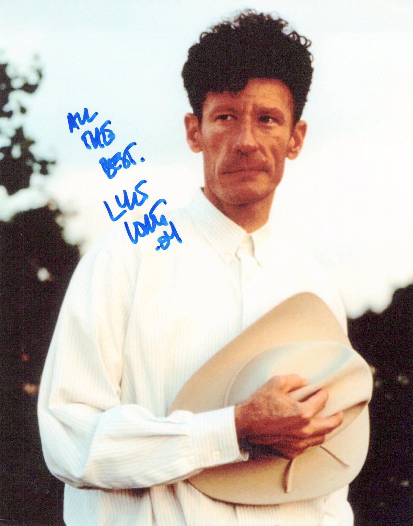 Lyle Lovett SINGER In Person Signed Photo: Photo size is 8x10. Lyle Lovett in person signed photo. Lyle Lovett is a Grammy-winning American singer, actor, and Quarter Horse breeder who has been active since 1980. Born in 1957 and raised on a T